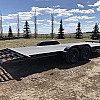 Black 2026 Rainbow Trailers 22' Excursion Tilt Deck Trailer