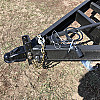 Black 2026 Rainbow Trailers 22' Excursion Tilt Deck Trailer
