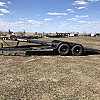 Black 2026 Rainbow Trailers 22' Excursion Tilt Deck Trailer
