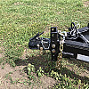 Black 2026 Rainbow Trailers 20' Excursion Tilt Deck Trailer