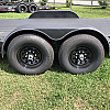 Black 2026 Rainbow Trailers 20' Excursion Tilt Deck Trailer