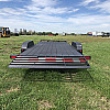 Black 2026 Rainbow Trailers 20' Excursion Tilt Deck Trailer