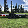 Black 2026 Rainbow Trailers 20' Excursion Tilt Deck Trailer