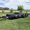 Black 2026 Rainbow Trailers 18' Excursion Tilt Deck Trailer