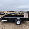 Black 2026 Rainbow Trailers 7'x12' Express Utility Trailer Solid Sides