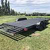 Black 2026 Rainbow Trailers 20' Excursion Tilt Deck Trailer