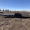 Black 2026 Rainbow Trailers 22' Excursion Tilt Deck Trailer