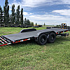 Black 2026 Rainbow Trailers 20' Excursion Tilt Deck Trailer