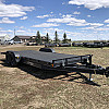 Black 2026 Rainbow Trailers 22' Excursion Tilt Deck Trailer