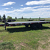 Black 2026 Rainbow Trailers 20' Deck Above