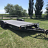 Black 2026 Rainbow Trailers 20' Excursion Tilt Deck Trailer