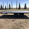 Black 2026 Rainbow Trailers 14' Express Deck Above
