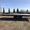 Black 2026 Rainbow Trailers 18' Deck Above