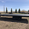 Black 2026 Rainbow Trailers 18' Deck Above