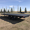 Black 2026 Rainbow Trailers 18' Deck Above