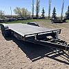 Black 2026 Rainbow Trailers 20' Excursion Tilt Deck Trailer