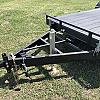 Black 2026 Rainbow Trailers 20' Excursion Tilt Deck Trailer