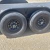 Black 2027 Rainbow Trailers 20' HD Equipment Trailer - Slide Out Ramps