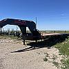 Black 2027 Double A 30' Pro Gooseneck Flatdeck Trailer 2x10,000 lb Axles at FM Trailer World