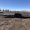 Black 2027 Rainbow Trailers 22' Excursion Tilt Deck Trailer