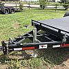 Black 2027 Rainbow Trailers 20' Excursion Tilt Deck Trailer