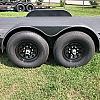 Black 2027 Rainbow Trailers 20' Excursion Tilt Deck Trailer