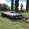 Black 2027 Rainbow Trailers 20' Excursion Tilt Deck Trailer