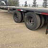 Charcoal 2027 Double A 32' Pro Gooseneck Flatdeck Trailer 2x10,000 lb Axles at FM Trailer World