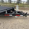 Black 2027 Rainbow Trailers 20' Excursion Tilt Deck Trailer 2x7000 lb Axles at FM Trailer World