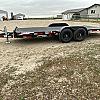 Black 2027 Rainbow Trailers 20' Excursion Tilt Deck Trailer 2x7000 lb Axles at FM Trailer World