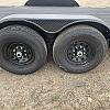 Black 2027 Rainbow Trailers 20' Excursion Tilt Deck Trailer 2x7000 lb Axles at FM Trailer World