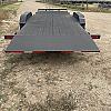 Black 2027 Rainbow Trailers 20' Excursion Tilt Deck Trailer 2x7000 lb Axles at FM Trailer World