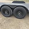 Black 2027 Rainbow Trailers 22' Excursion Tilt Deck Trailer 2x7000 lb Axles at FM Trailer World
