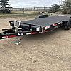 Black 2027 Rainbow Trailers 22' Excursion Tilt Deck Trailer 2x7000 lb Axles at FM Trailer World