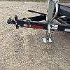 Black 2027 Rainbow Trailers 22' Excursion Tilt Deck Trailer 2x7000 lb Axles at FM Trailer World