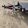 Black 2027 Rainbow Trailers 22' Excursion Tilt Deck Trailer 2x7000 lb Axles at FM Trailer World