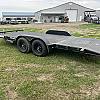 Black 2027 Rainbow Trailers 18' Excursion Tilt Deck Trailer 2x5,200 lb Axles at FM Trailer World