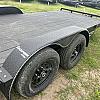 Black 2027 Rainbow Trailers 18' Excursion Tilt Deck Trailer 2x5,200 lb Axles at FM Trailer World