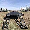 Black 2027 Rainbow Trailers 20' Deck Above 2x5,200 lb Axles at FM Trailer World
