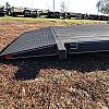 Black 2027 Rainbow Trailers 22' Excursion Tilt Deck Trailer 2x5200 lb Axles at FM Trailer World