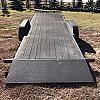 Black 2027 Rainbow Trailers 22' Excursion Tilt Deck Trailer 2x5200 lb Axles at FM Trailer World