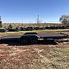 Black 2027 Rainbow Trailers 22' Excursion Tilt Deck Trailer 2x5200 lb Axles at FM Trailer World