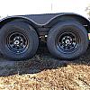 Black 2027 Rainbow Trailers 22' Excursion Tilt Deck Trailer 2x5200 lb Axles at FM Trailer World