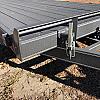 Black 2027 Rainbow Trailers 22' Excursion Tilt Deck Trailer 2x5200 lb Axles at FM Trailer World – Image 20